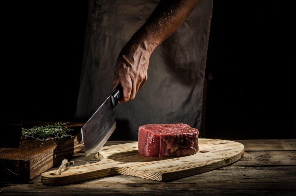 Chef butcher prepare beef steak